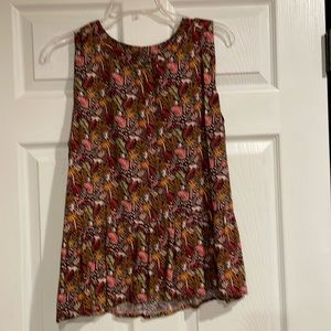 Sleeveless peplum top